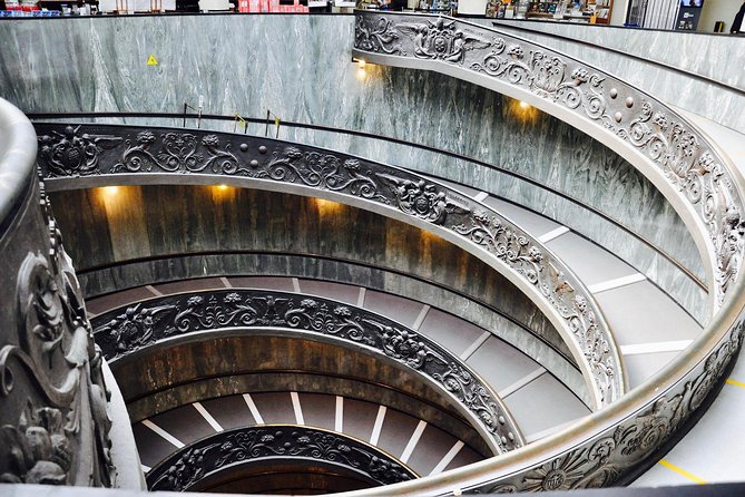 Skip the Line: Small Group Vatican & Sistine + Basilica Option - Pio Clementino wing: Laocoonte, Apollo Belvedere, and the Candelabra Gallery ceiling trick