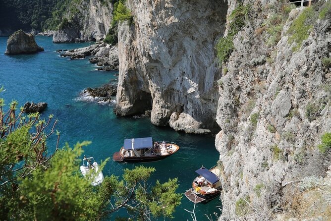 Small Group Boat Tour Capri & Blue Grotto with Swimming Stops - Swimming and snorkeling breaks, plus the open bar that makes the day easier