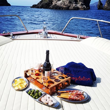 Small Group Boat Tour: Day Cruise from Sorrento to Capri - Capri from the water: grottos, arches, and Faraglioni views
