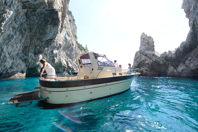 Small Group Capri Island Boat Ride with Swimming and Limoncello - I Faraglioni: the Capri sea stacks that anchor the whole experience