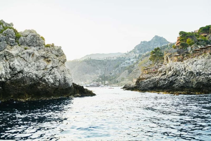 Taormina: Sunset Boat Tour with Dolphin Watching & Aperitif - Caves You Can Actually Appreciate, Grottos by Name