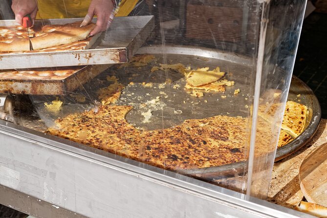Taste Genoa: A Full Meal Walking Food Tour by Do Eat Better - Stop 2 at Il Cittadino: Recco-style cheese focaccia with Stracchino
