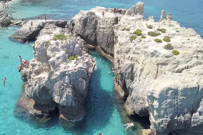 The best Boat Tour from Tropea to CapoVaticano, max 12 passengers - The guides and the vibe on board