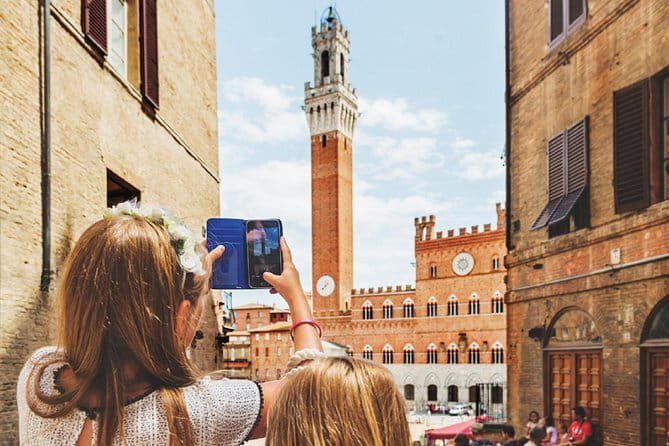 Tuscany Day Trip: Chianti & Cooking Class Small Group - San Gimignano: towers, shopping breaks, and why you feel the stairs