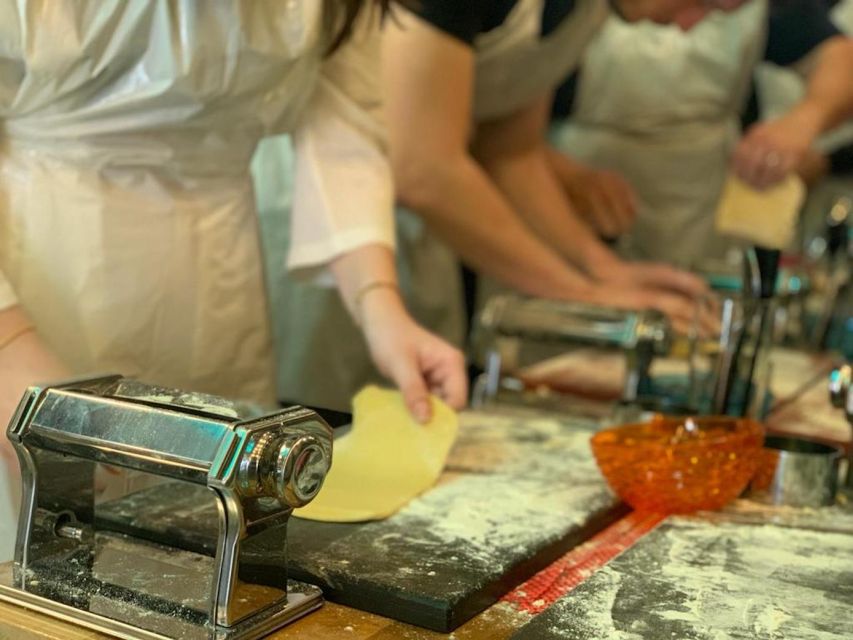 Venice: Pasta and Tiramisu Cooking Class with Wine - Entering the restaurant in Dorsoduro, then settling into a group dinner mood