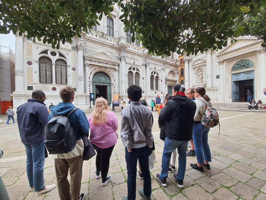 Venice: Walking Guided Tour of the City Must-See Sites - The First Stretch: Scuola Grande di San Rocco (and why you see it from outside)
